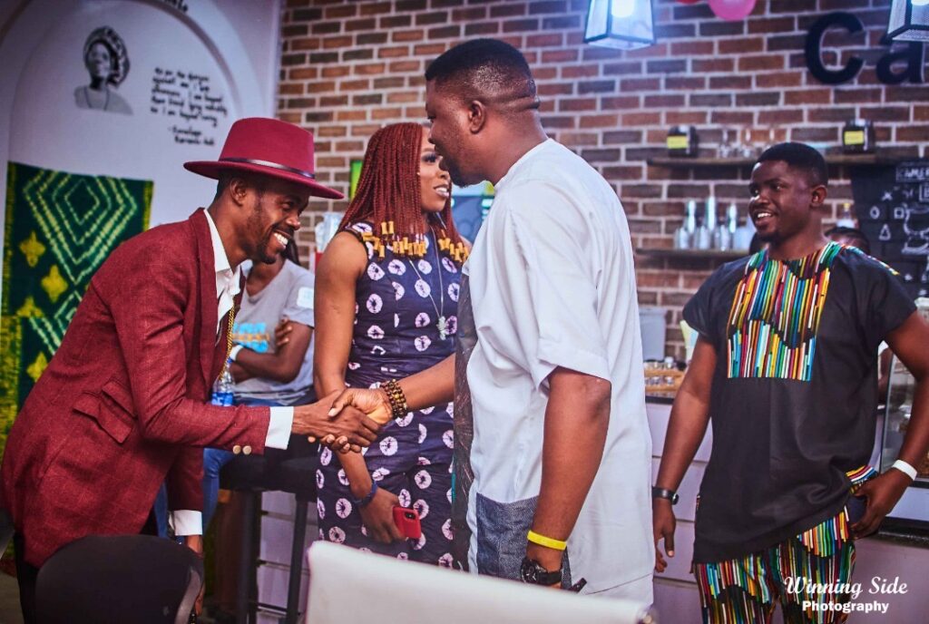 Guests greet each other at the AfroLiterary Fashion Concert 1.0, Cafe One, Ibadan (Photo: Winning Side Photography)