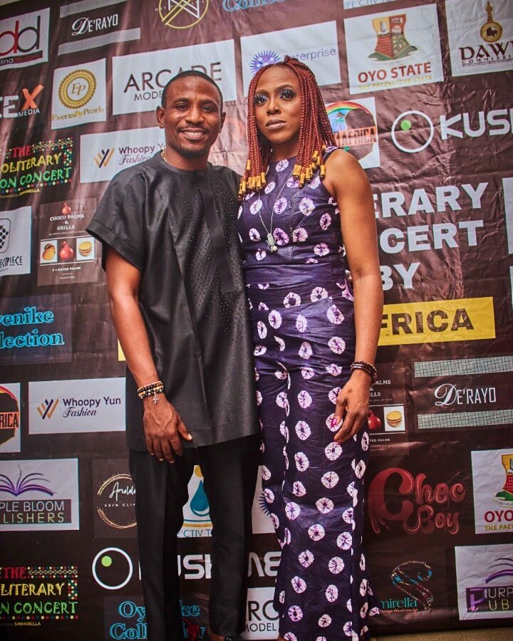 Guests on the red carpet at the AfroLiterary Fashion Concert 1.0 in front of the sponsors wall (Photo: Winning Side Photography)